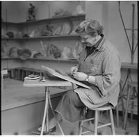 Evelyn Raymond working with clay in her Minneapolis studio, 1959
